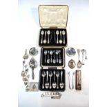 A cased set of six silver rat-tail coffee spoons with tongs,