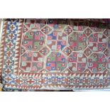 A South Uzbekistan kelim Suzani, woven in colours on camel ground, circa 1930's,