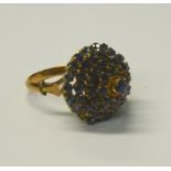 A sapphire set tiered dome ring,