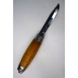 A Swedish barrel knife, the folding 10 cm single edged blade folding within the wooden handle,