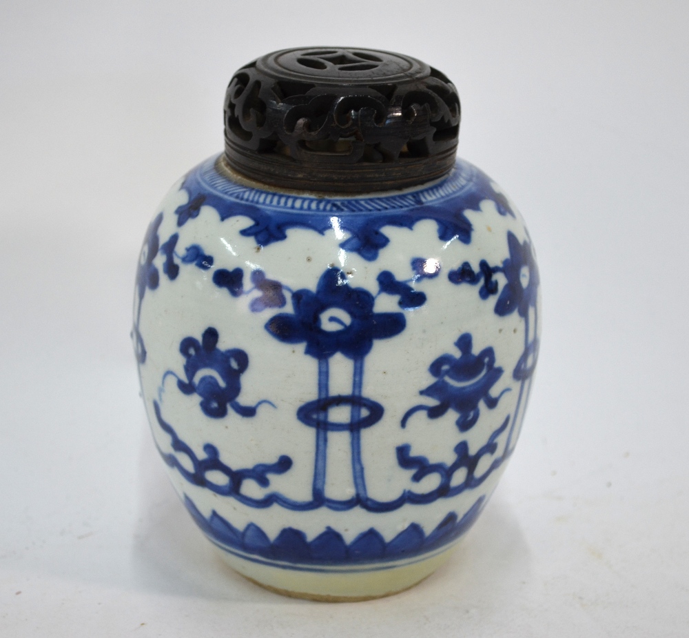 A Chinese blue and white oviform vase or ginger jar with associated wood cover;