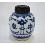 A Chinese blue and white oviform vase or ginger jar with associated wood cover;