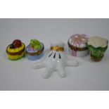 Five various Limoges porcelain novelty patch-boxes including a Dubarry Disney Mickey Mouse hand,
