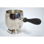 A Georg Jensen silver brandy warmer of ovoid form on raised foot,