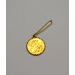A 1912 sovereign in rope style mount with long pendant hang,
