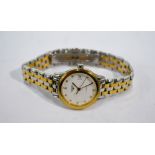 A lady's Longines stainless steel and gilt wristwatch with automatic movement and 20 mm dial,