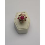 A ruby and diamond ballerina style cluster ring,
