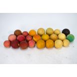 Twenty-three various antique turned ivory billiard and snooker balls, all a/f,