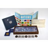 A Franklin Mint set of silver Official Flags of the United Nations in fitted display case (146 in