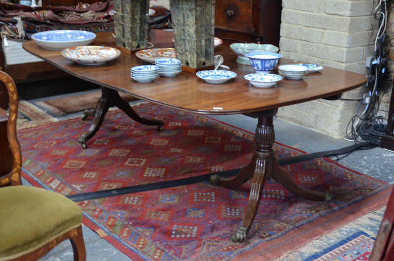 A mahogany twin pedestal dining table,