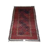 An antique Persian Baluch rug, circa 1900,