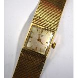 A lady's 9ct gold Vertex Revue wristwatch with 17-jewel Swiss movement and 15mm square silvered