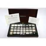 A cased set of thirty official World Wildlife Fund silver ingots