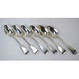 A matched set of six George IV - Victorian silver fiddle pattern dessert spoons, Exeter 1825/33/43,
