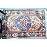 An antique Persian Brojerd rug,