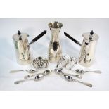 A late Victorian small silver chamberstick, Birmingham 1900, to/w a small pair of toast racks,