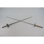 A cup-hilted rapier with triple-fullered convex tapering blade, 69 cm,