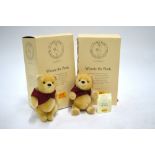 Two Steiff Winnie-the-Pooh teddy bears, limited edition 2001, 18 cm high,