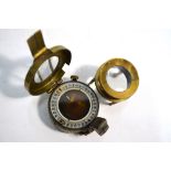 An Edwardian Army & Navy Co-operative Society gilt pocket barometer with silvered dial,