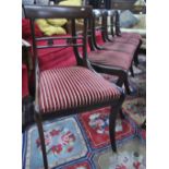 A set of five Victorian mahogany bar back standard side chairs each with fabric seats,