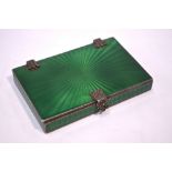 An Art Deco green basse-taille enamelled silver visiting card case with marcasite-set mounts and