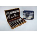 A Victorian set of six each engraved silver dessert knives and forks with carved mother of pearl