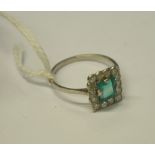 An antique emerald and diamond cluster ring,