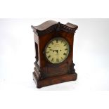 Simmons, Coleman St, London - a Regency flame mahogany bracket clock,