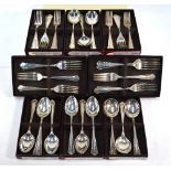 A heavy quality set of 'Chippendale' pattern silver flatware comprising; twelve each table forks,
