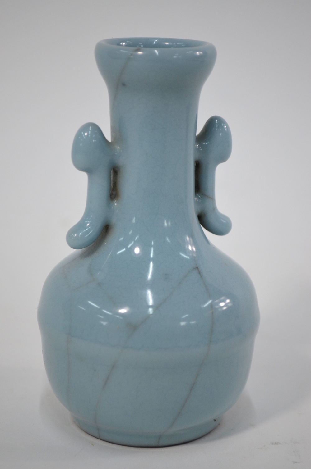 A Chinese small clair-de-lune (yueh pai style) vase with trumpet neck and pierced handles;