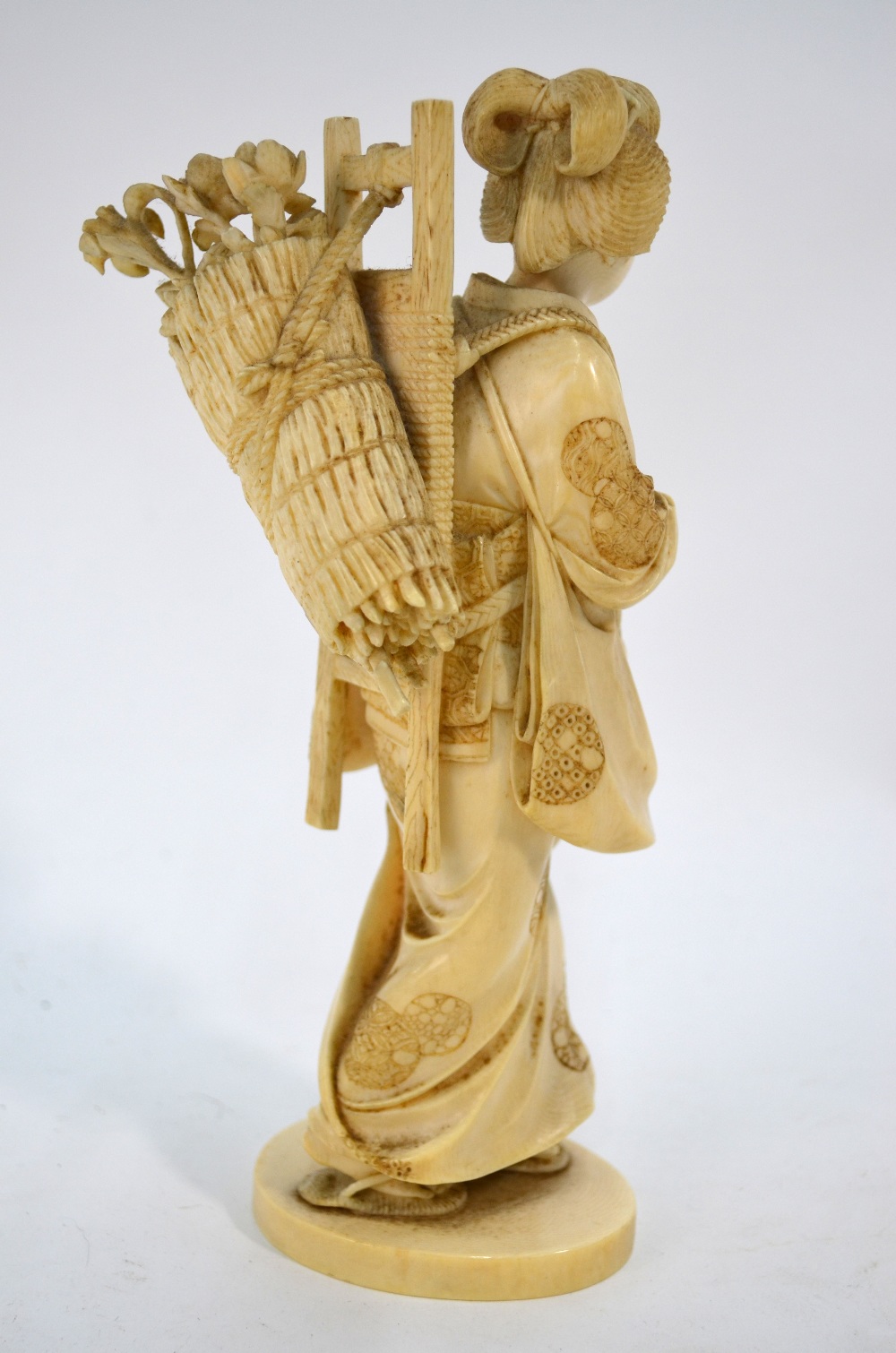 A Japanese ivory Okimono, carved as a Yamato Nadeshkom wearing zori, - Image 4 of 6