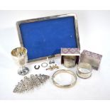 Various oddments of silver, including two napkin rings, a small trophy cup, photograph frame,