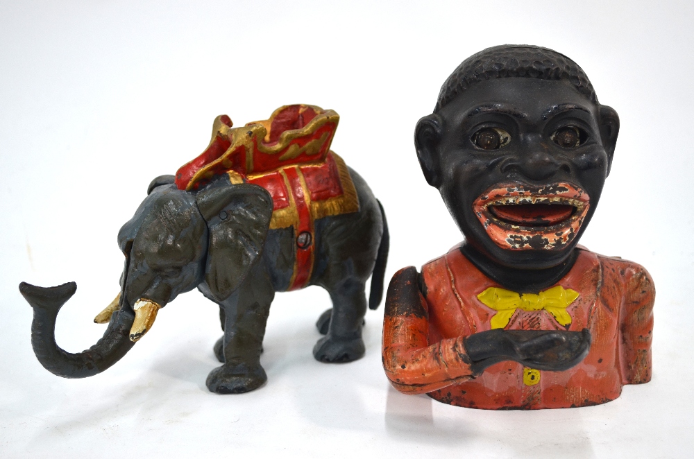Two cold-painted cast iron novelty money boxes,