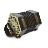 A Victorian ebonised hexagonal concertina by C.
