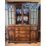 A diminutive Victorian style mahogany breakfront library secretaire bookcase with astragal glazed