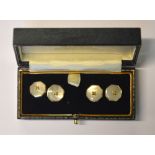 Pair of octagonal mother of pearl cufflinks, silver-gilt set,