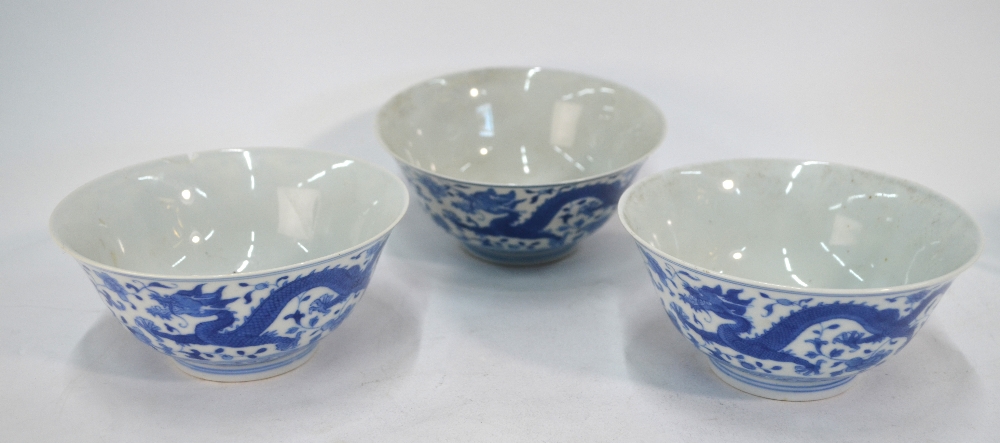 A Chinese set of three blue and white bowls; - Image 2 of 5