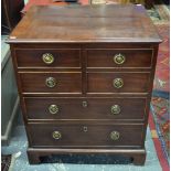 A 19th century diminutive mahogany chest of two short over two long graduated drawers,