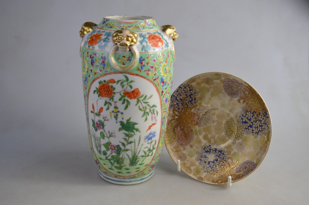 A Chinese famille rose vase, decorated with floral designs, 19.