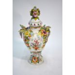 A Sitzendorf porcelain twin handle urn and cover,