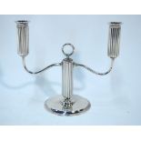 A Georg Jensen Sterling reeded twin-branch candelabrum designed by Sigvard Bernadotte, No.