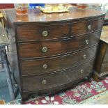 A Victorian mahogany bowfront chest of two short over three long graduated drawers,