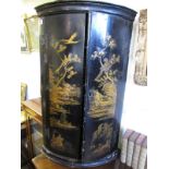 George III Black japanned chinoiserie bow-fronted cupboard, fitted interior.