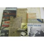 WWII eye shields, anti-gas Mk II. Military handbooks (2), wartime combined operations magazines (