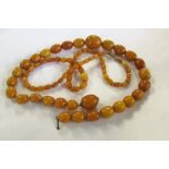 Butterscotch amber necklace and a finer bead amber necklace.