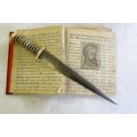 Bone and ebony handle, steel blade dagger together with hand written note book circa 1887 'The Sudan