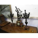 French dark red marble clock set. The clock mounted with girl and young tree, pair of candelabra.