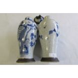 Pair of Chinese blue and white porcelain jars (one lid missing), bird and crackleure design.