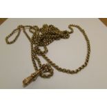 9ct gold Victorian muff chain approximately 38 grammes.