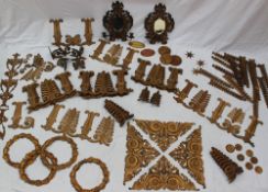 A collection of gilt metal mouldings, acanthus leaves, anthemions, corner brackets,
